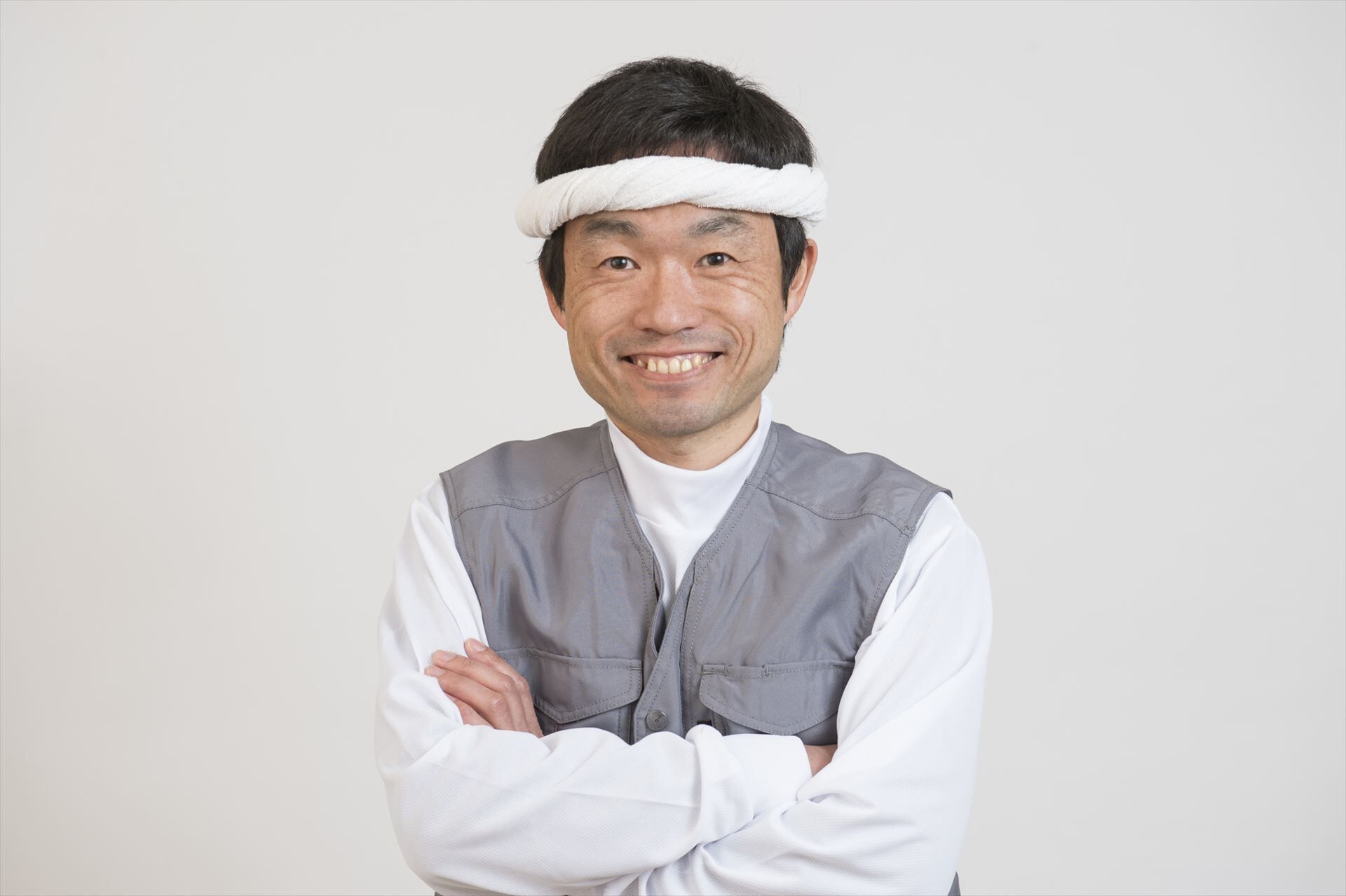 腕組みしてポーズを決める職人